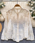 White embroidered linen shirt with floral sequin detailing - breathable summer blouse for women