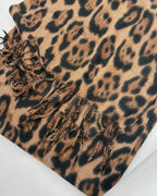 The Wild Elegance Winter Wrap shown as shoulder shawl or flat lay displaying full wild animal print and generous 200x68cm size
